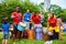 African American male and female percussionists playing djembe and dunun drums at Tam Tams festival in Mount Royal Park