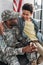 African american male soldier embracing