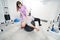 African American man doing physical therapy exercise with instructor