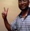 African american man gesturing a peace sign