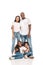 African american man hugging wife while standing near chidren sitting on white background