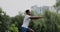 African american man limbering-up and stretching legs after running jog workout. Runner stretching and warming-up before