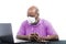 African American Man with medical mask on Laptop Computer. Concept of Lockdown, Flatten the Curve, Social Distancing, State of