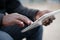 African american man uses tablet computer. Black man hands holds tablet pc