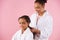 African American mother braids plait of little