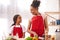 African American mother and daughter preparing