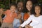 African American mother and father and their children.