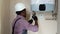 African American Plumber Installing a Boiler