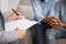 African American Spouses Holding Hands Visiting Marital Therapist