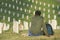 African-American Veteran Sitting in Cemetery, Los Angles, California