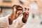 African american woman breaking cigarette at street