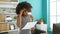 African american woman business worker reading document at the office