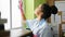 African american woman clean professional cleaning window at office