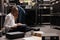 African american woman detective reviewing case file on floor