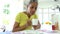 African American Woman Eating Breakfast And Reading Newspaper