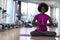 African american woman exercise yoga in gym