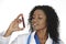 African American woman laboratory technician examining a tube of blood