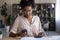 African American woman manage finances using cellphone