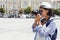 African-american woman photographing with camera on vacation