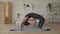 African american woman practicing yoga upward bow