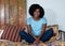 African american woman relaxing indoor at home