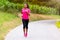 African american woman runner jogging outdoors - Fitness, peopl