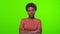 African American woman shows prohibitory sign and says no, on chroma key