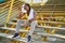 African american woman sitting on stairs sweating at street