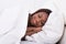 African american woman sleeping in bed