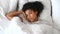 An African-American woman suffer from insomnia