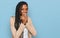 African american woman wearing business jacket laughing and embarrassed giggle covering mouth with hands, gossip and scandal