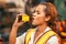 African American Woman Worker Drinking Energy Drink During Relax Brake Work In Heavy Factory