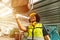 African American woman worker happy smiling working operate machine in heavy industry factory