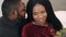 African american young couple celebrating Valentine\'s day at home