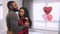 African american young couple celebrating Valentine\'s day at home