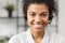 African American young lady wearing a headset