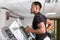 African American young man doing cardio workout at the gym