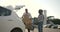 African arabian couple pack grocery in a car