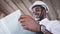 African architects engineer looking with a blueprint work together in the inside the construction building site