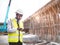 African architects engineer man with tablet work together in the inside the construction building site.Engineering concepts and