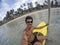 African Black American man having Fun Stand Up Paddling in the sea. Diversity, race, ethnicity and people concept image