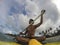 African Black American man having Fun Stand Up Paddling in the sea. Diversity, race, ethnicity and people concept image