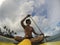 African Black American man having Fun Stand Up Paddling in the sea. Diversity, race, ethnicity and people concept image