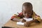 African black boy at School Writing with Copy Space