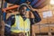 African black male staff worker enjoy happy working drive folk lift truck work in warehouse inventory manager