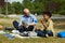 African Boy Talking to Teacher during Outdoor Lesson