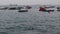 African Boys Teenagers Jump into the Water from High Embankment in Stone Town