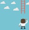 African businessman missing ladder climbing upwards. confused