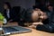 African businesswoman falls asleep