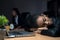 African businesswoman falls asleep